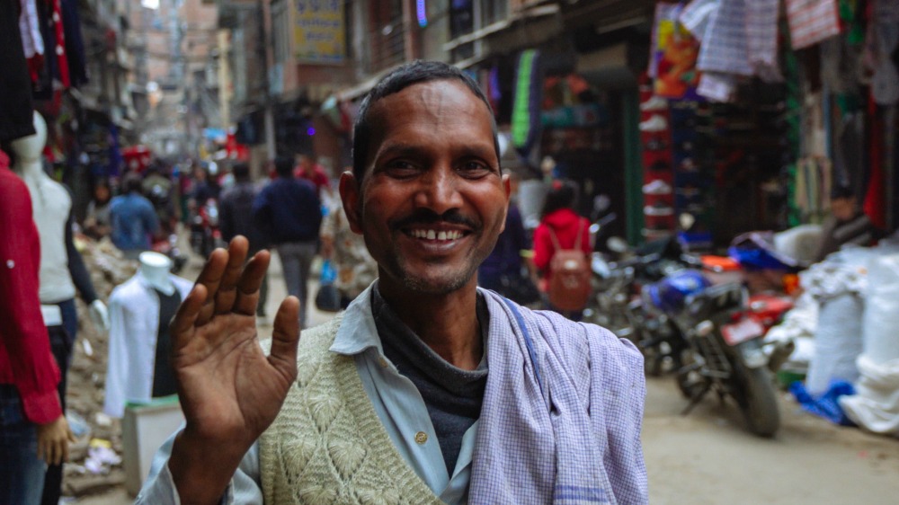 A local man waving in Kathmandu