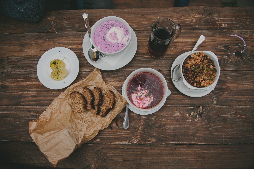 pink soup and other Lithuanian dishes on a table