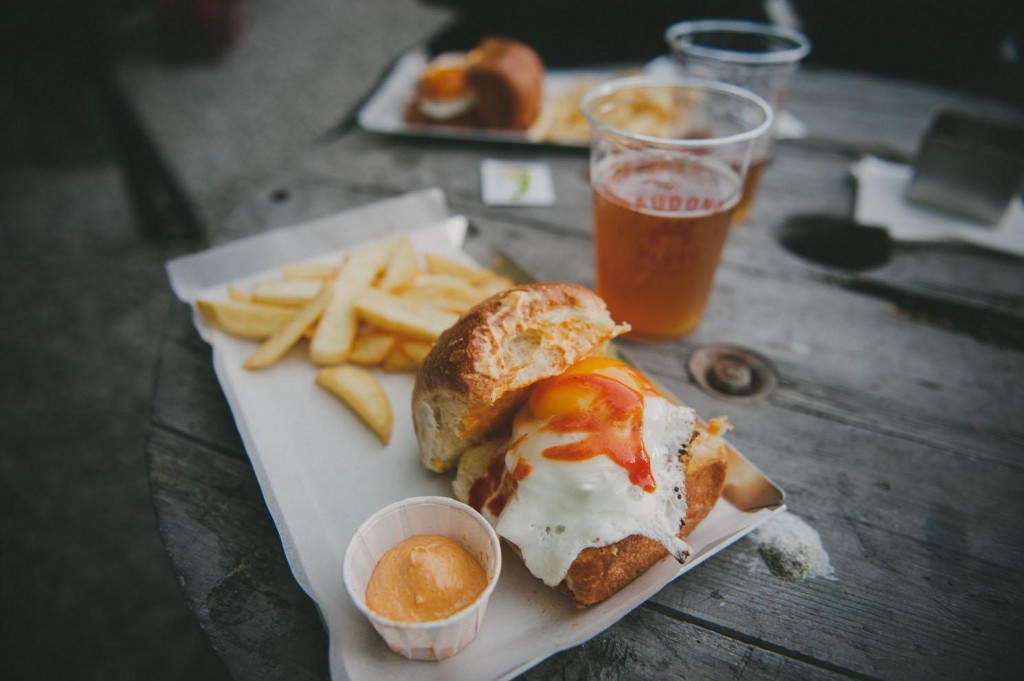 cheese sandwich with beer and french fries