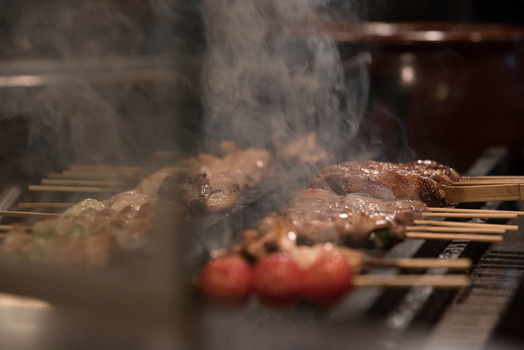 meat cooking on a grill in Tokyo